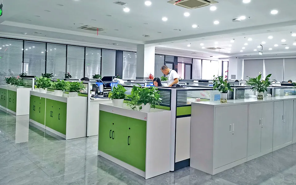 Relish team office with staff working at open-plan workstations.